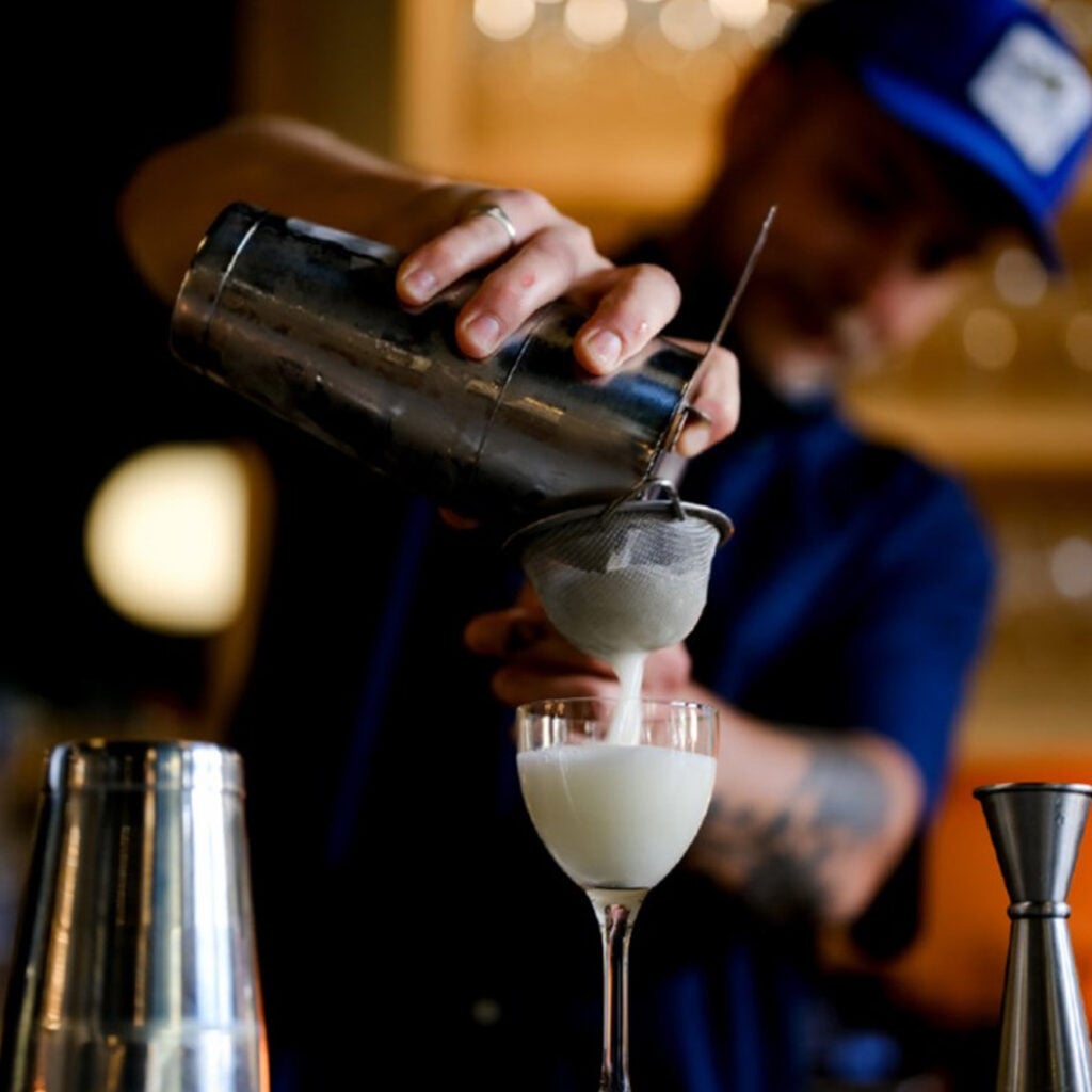 Bar Torino wine bottle shop wall